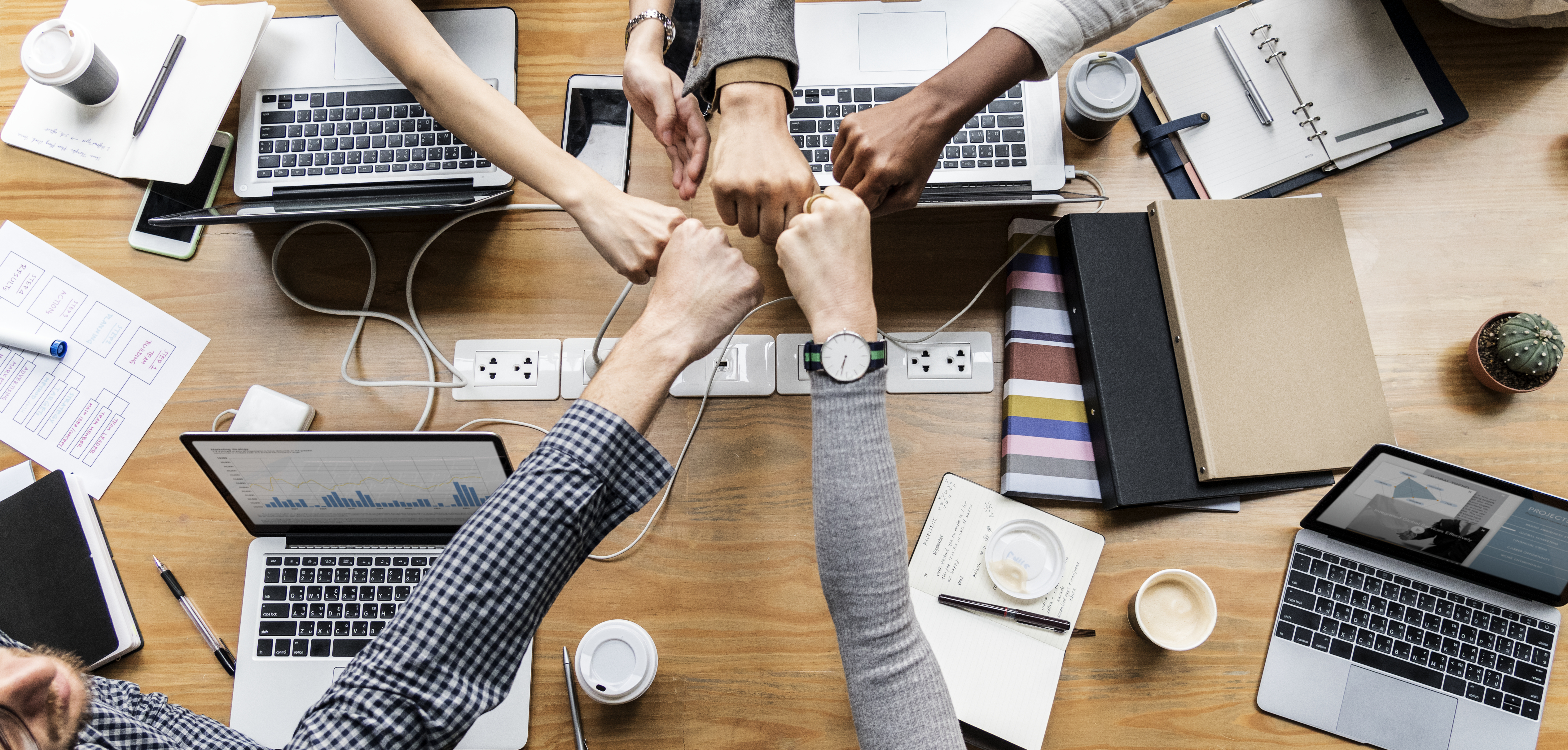 colleagues-giving-fist-bump (1)